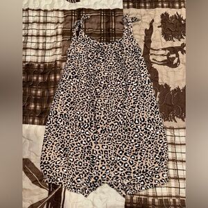 Cheetah print romper, worn 1 time.